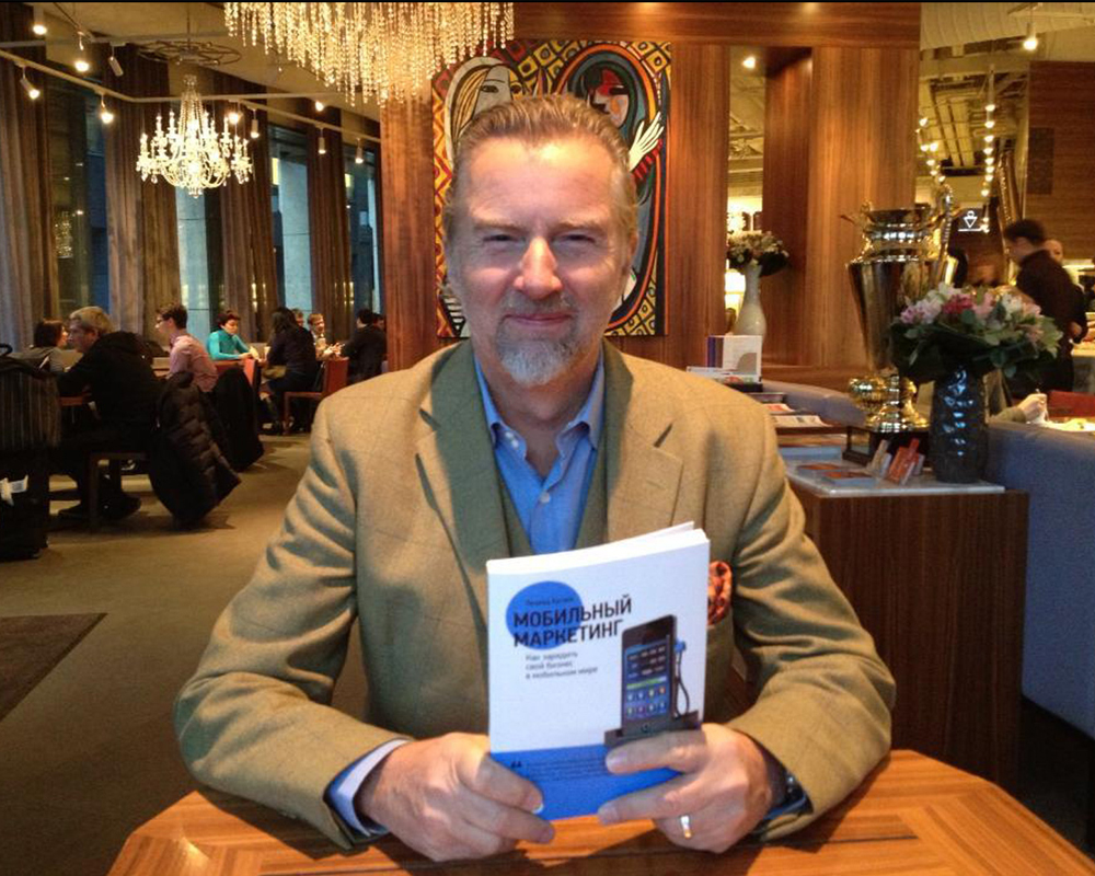 Thomas Gad, author of 4D Branding, with the book