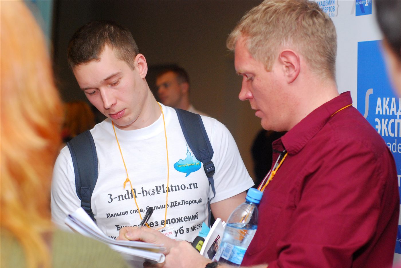 Signing books at a conference