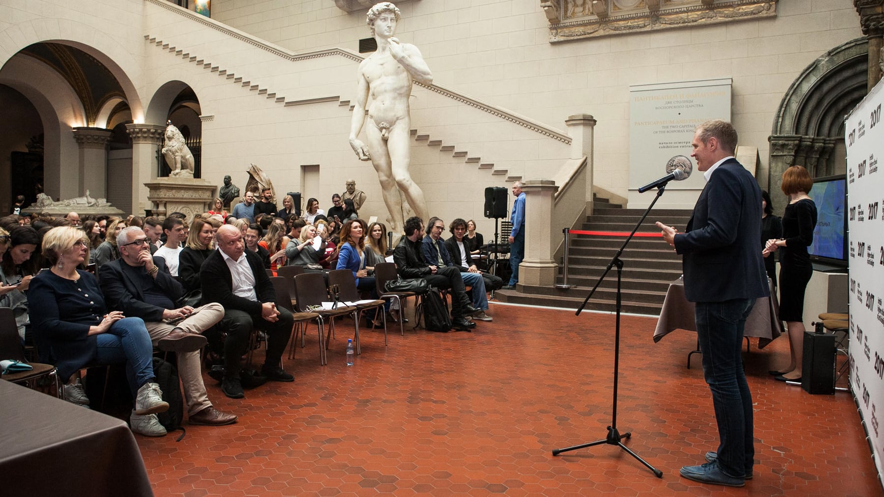 Leonid Bugaev speaking at a business event