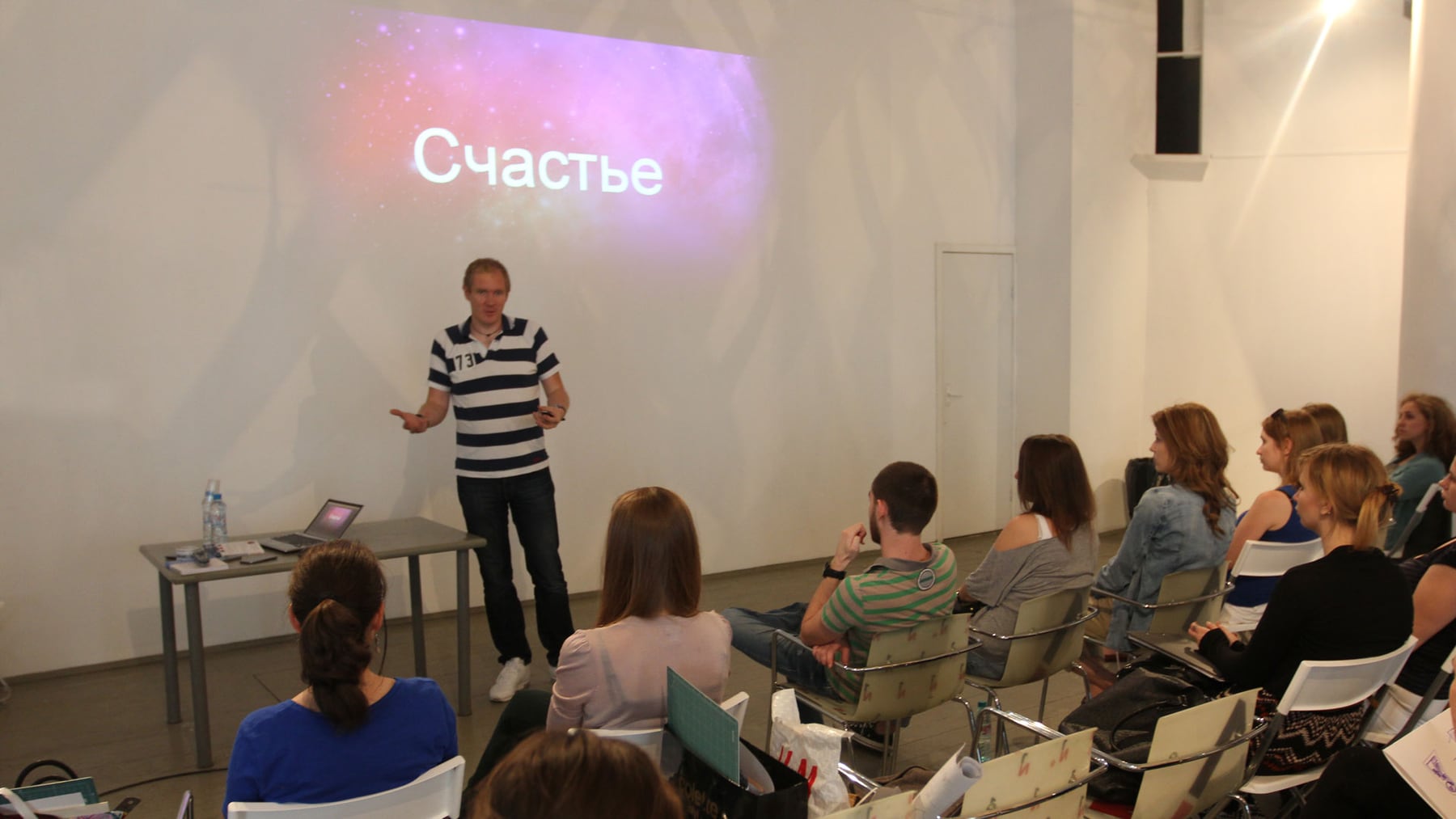 Leonid Bugaev speaking at a business event