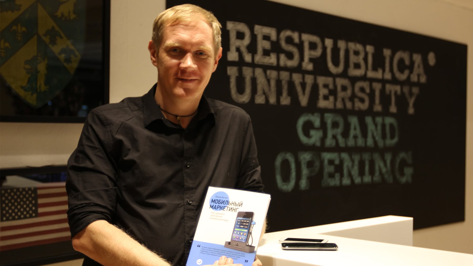 Leonid Bugaev speaking at a business event