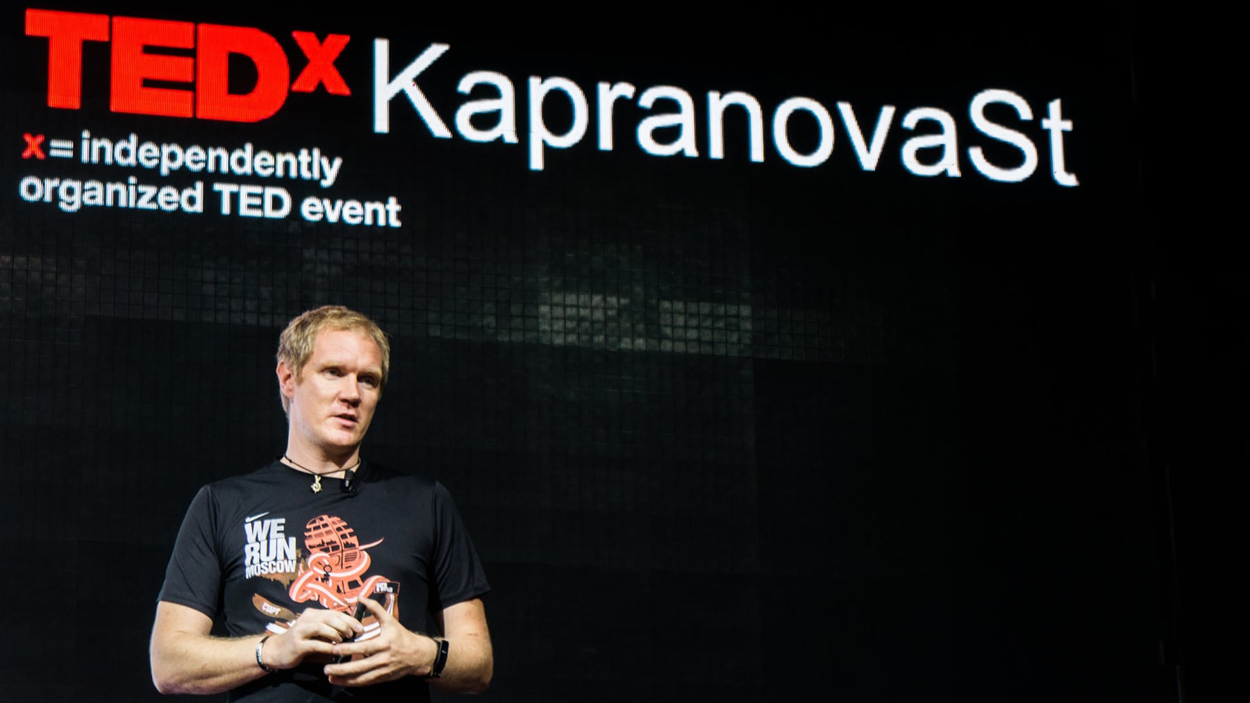 Leonid Bugaev speaking at a business event