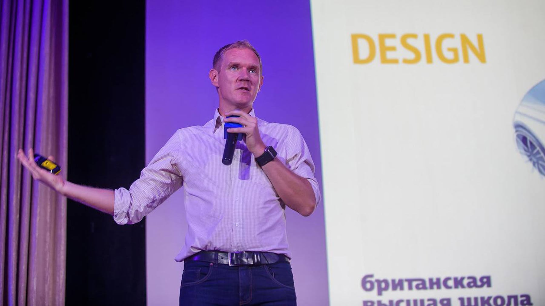 Leonid Bugaev speaking at a business event