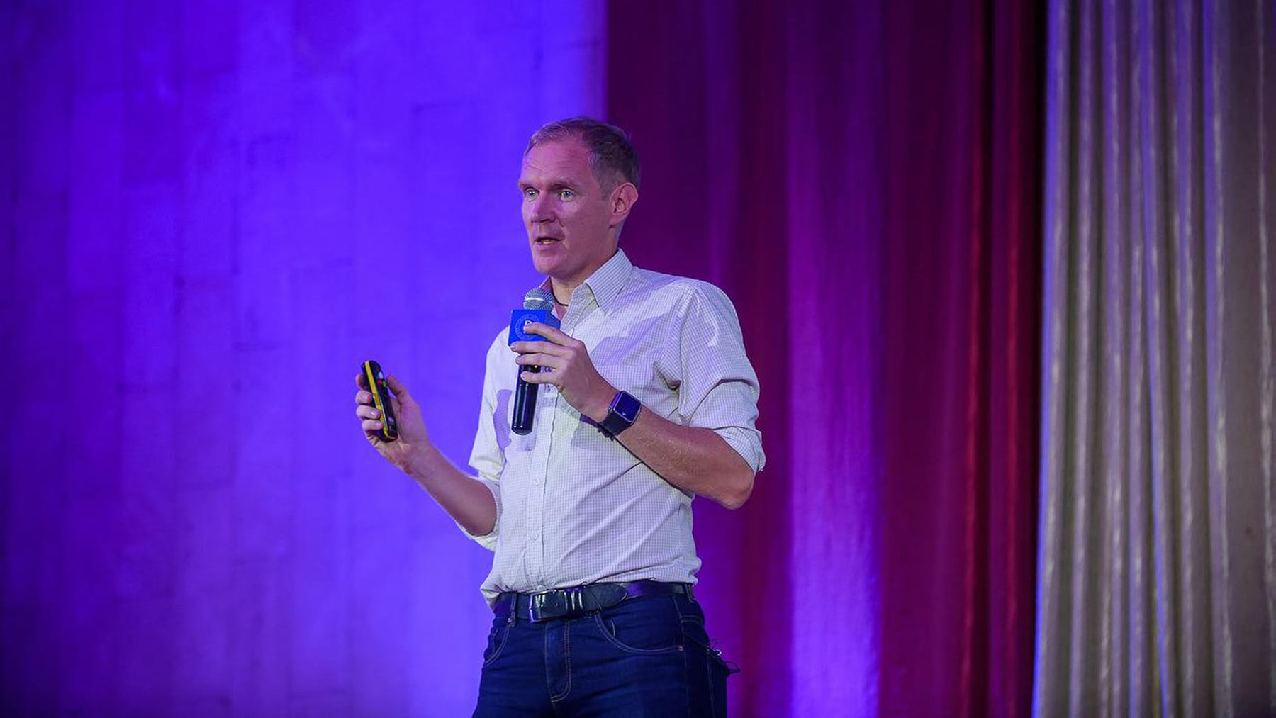Leonid Bugaev speaking at a business event