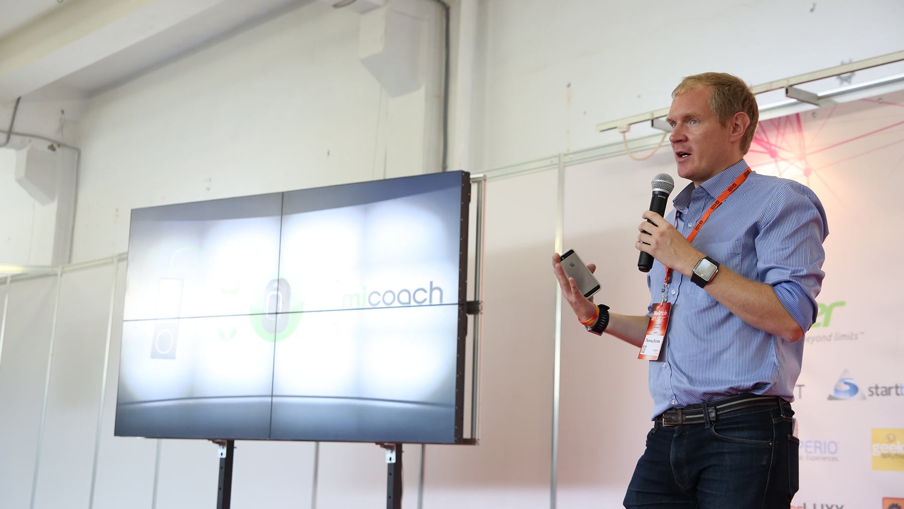 Leonid Bugaev speaking at a business event