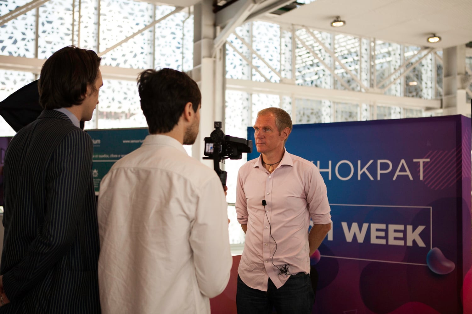 Leonid Bugaev speaking at a business event